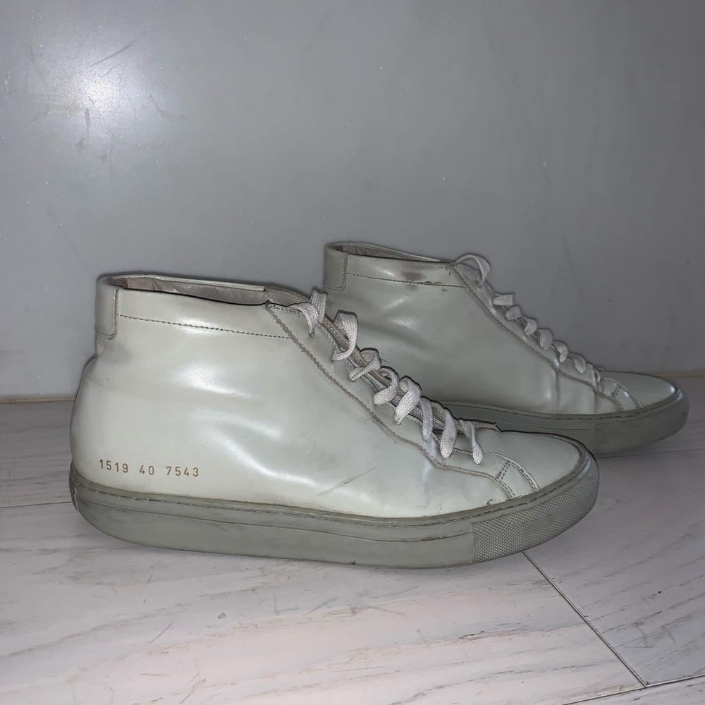 Light gray common project high tops